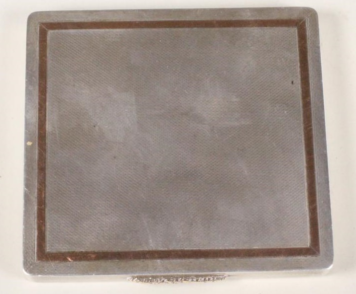 A SILVER CIGARETTE CASE Image