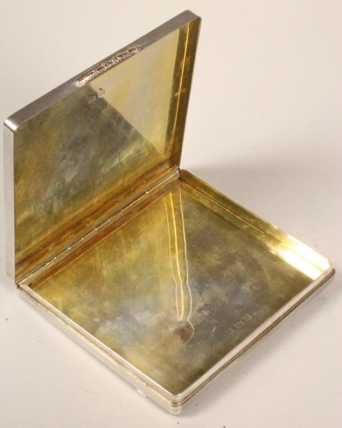 A SILVER CIGARETTE CASE Image