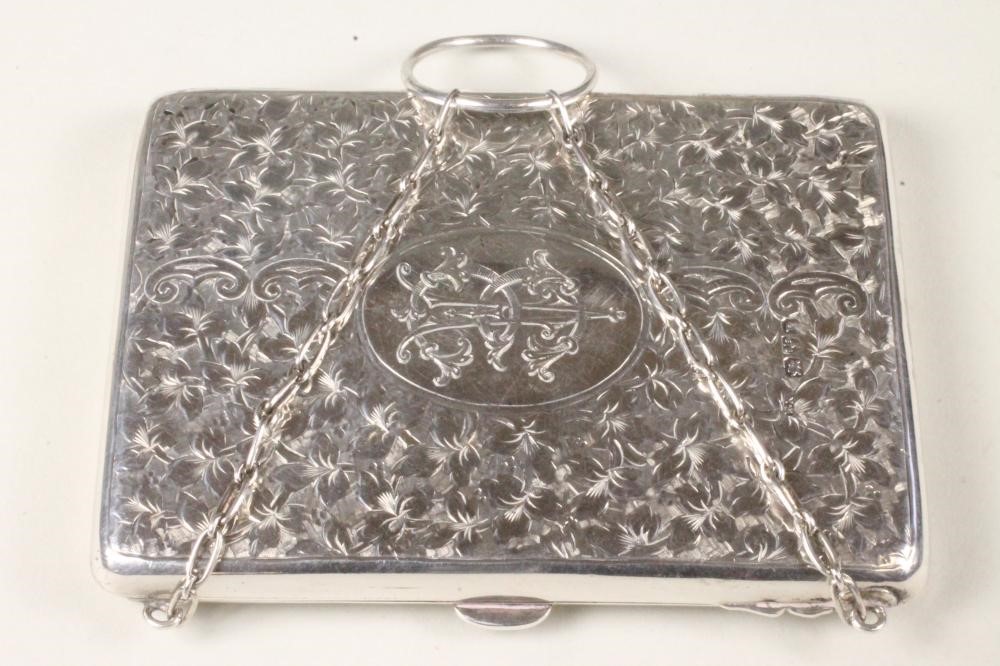 A LADY'S LATE VICTORIAN SILVER PURSE Image