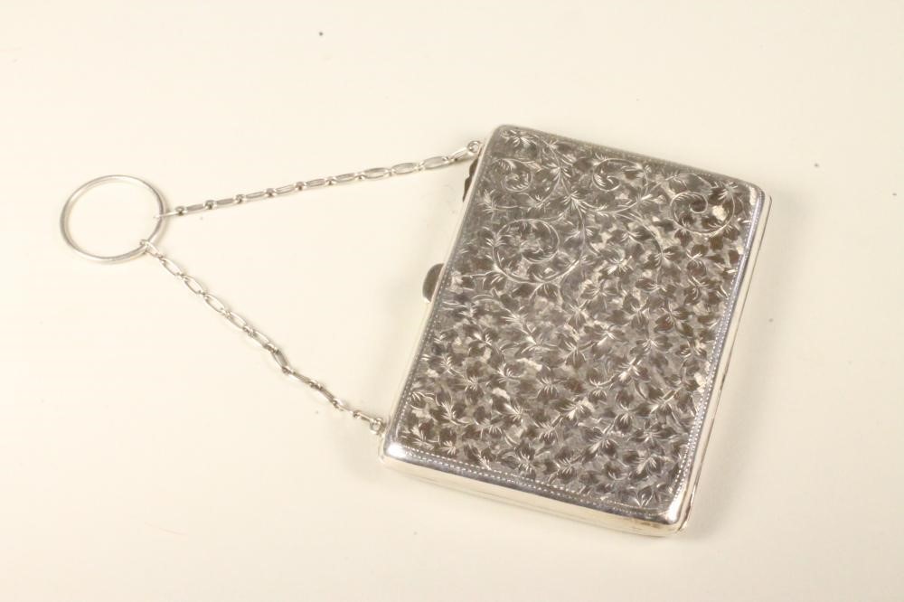 A LADY'S LATE VICTORIAN SILVER PURSE Image