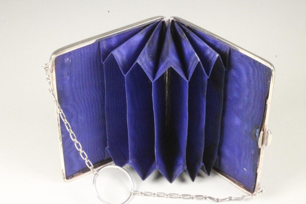 A LADY'S LATE VICTORIAN SILVER PURSE Image