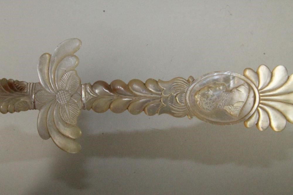 A SECTIONAL MOTHER OF PEARL PAPER KNIFE Image
