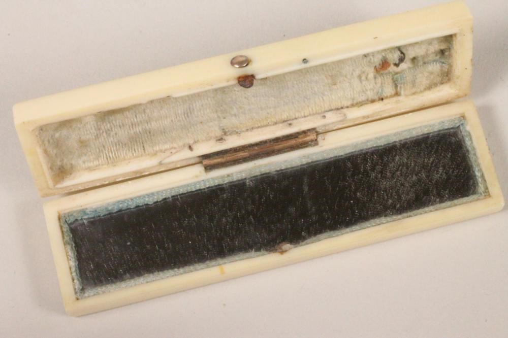 A GEORGIAN IVORY BOX of plain oblong form Image