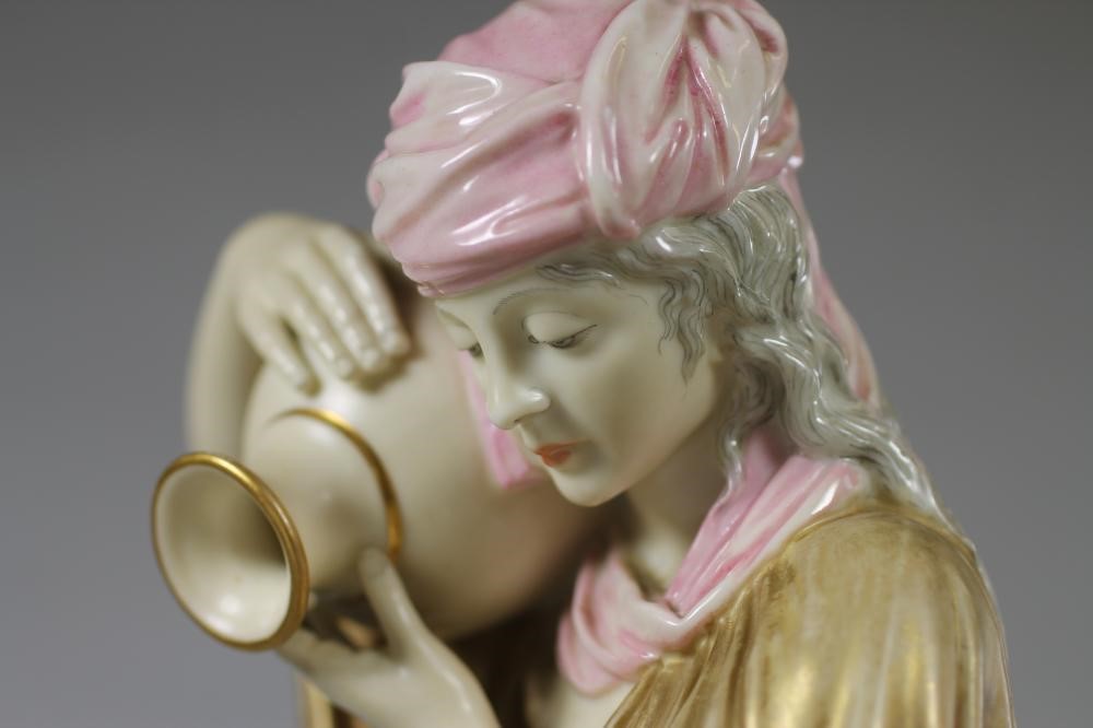 A ROYAL WORCESTER CHINA FIGURE Image