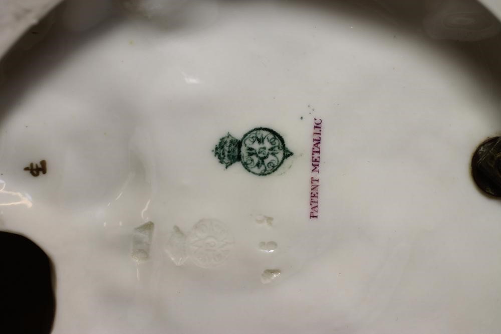 A ROYAL WORCESTER CHINA FIGURE Image