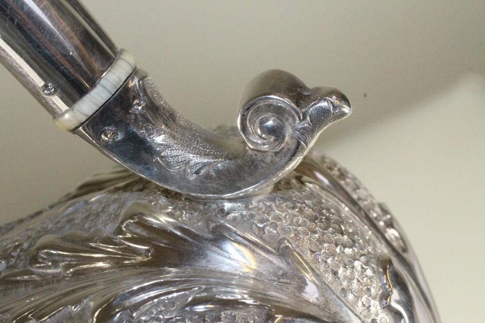 A SILVER HOT WATER JUG Image