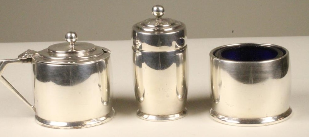AN ART DECO SILVER THREE PIECE CRUET Image