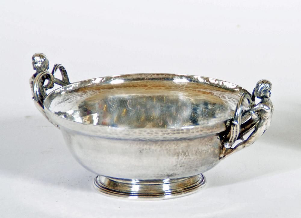AN ARTS AND CRAFTS SILVER PORRINGER Image