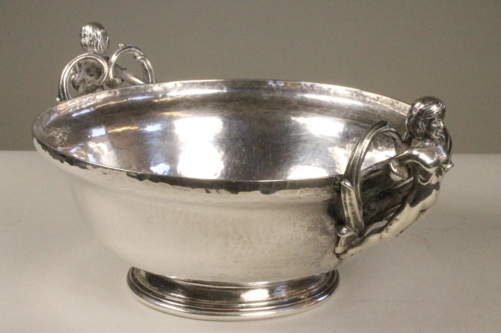 AN ARTS AND CRAFTS SILVER PORRINGER Image