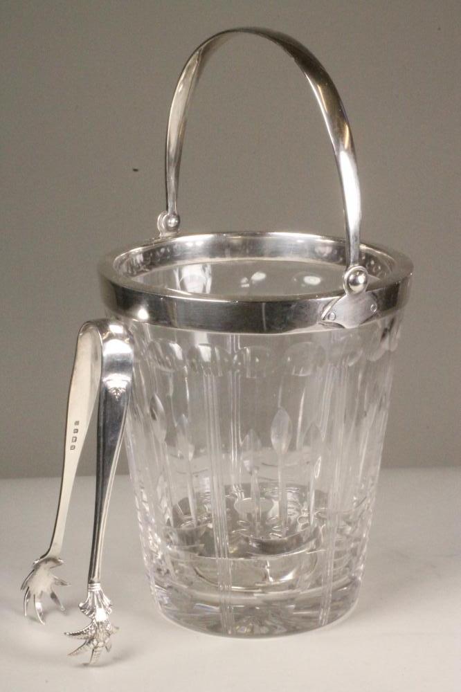 A SILVER MOUNTED GLASS ICE BUCKET Image