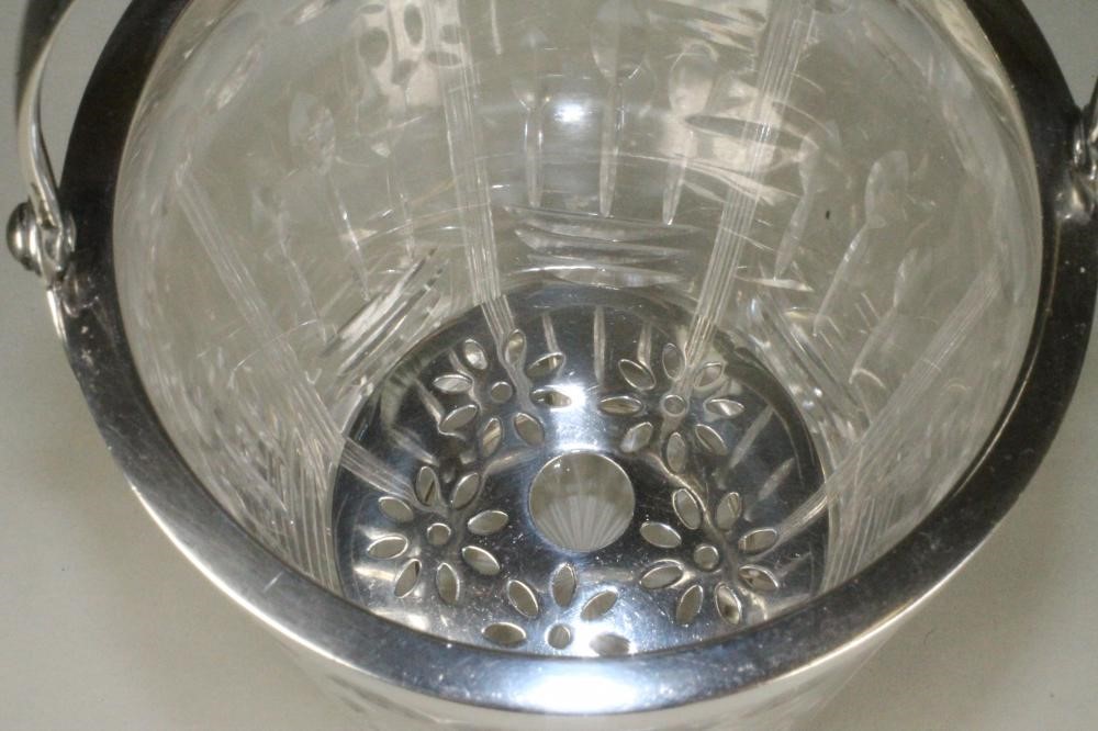 A SILVER MOUNTED GLASS ICE BUCKET Image