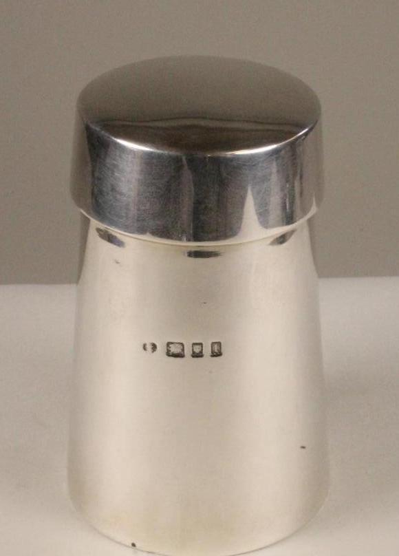 AN ART DECO SILVER CASTOR Image