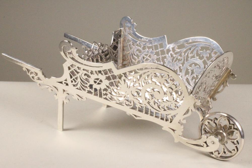 A NOVELTY SILVER SWEETMEAT HOLDER Image