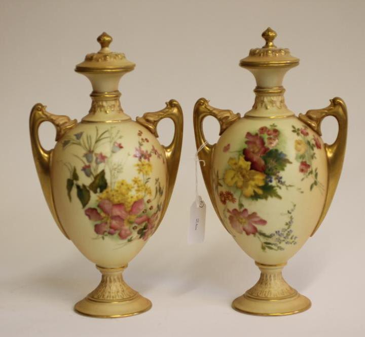 A PAIR OF ROYAL WORCESTER CHINA VASES AND COVERS Image