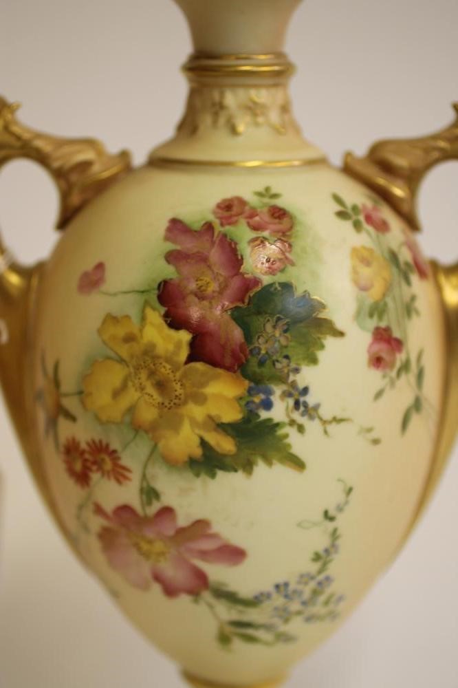 A PAIR OF ROYAL WORCESTER CHINA VASES AND COVERS Image