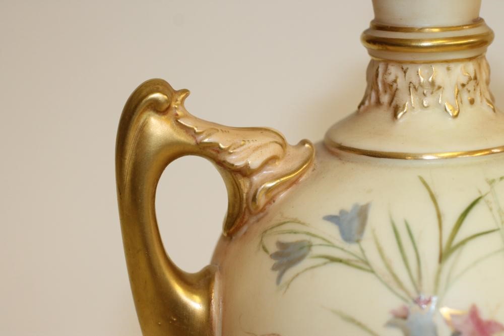A PAIR OF ROYAL WORCESTER CHINA VASES AND COVERS Image