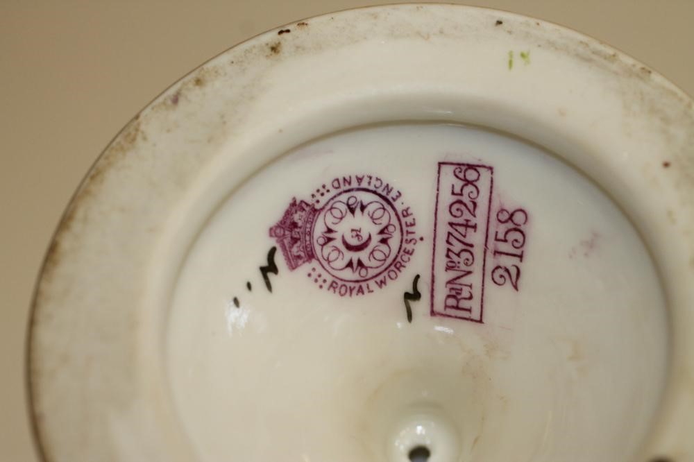 A PAIR OF ROYAL WORCESTER CHINA VASES AND COVERS Image