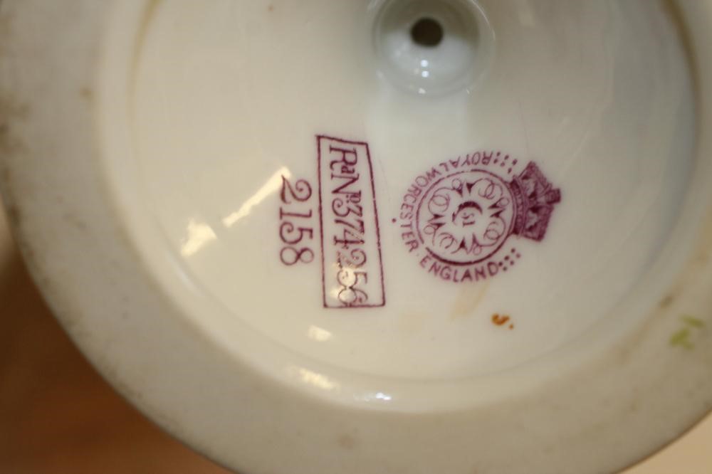 A PAIR OF ROYAL WORCESTER CHINA VASES AND COVERS Image