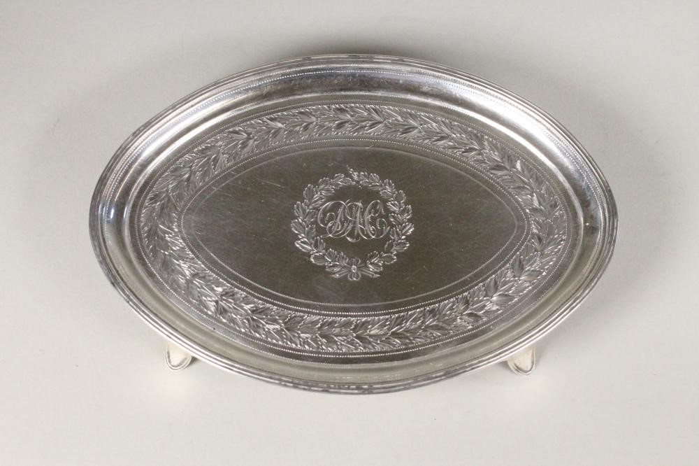 A LATE GEORGE III SILVER TEAPOT AND MATCHING STAND Image