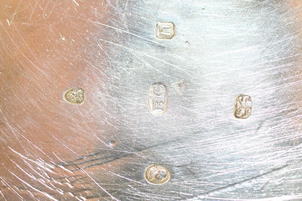 A LATE GEORGE III SILVER TEAPOT AND MATCHING STAND Image