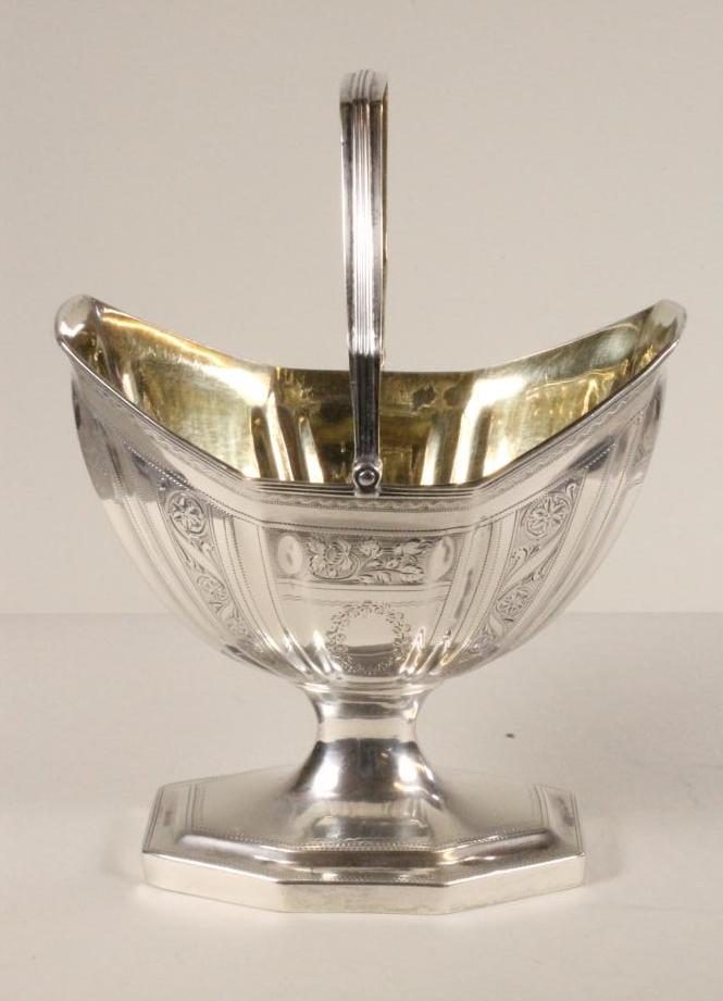 A LATE GEORGE III SILVER SUGAR BASKET Image