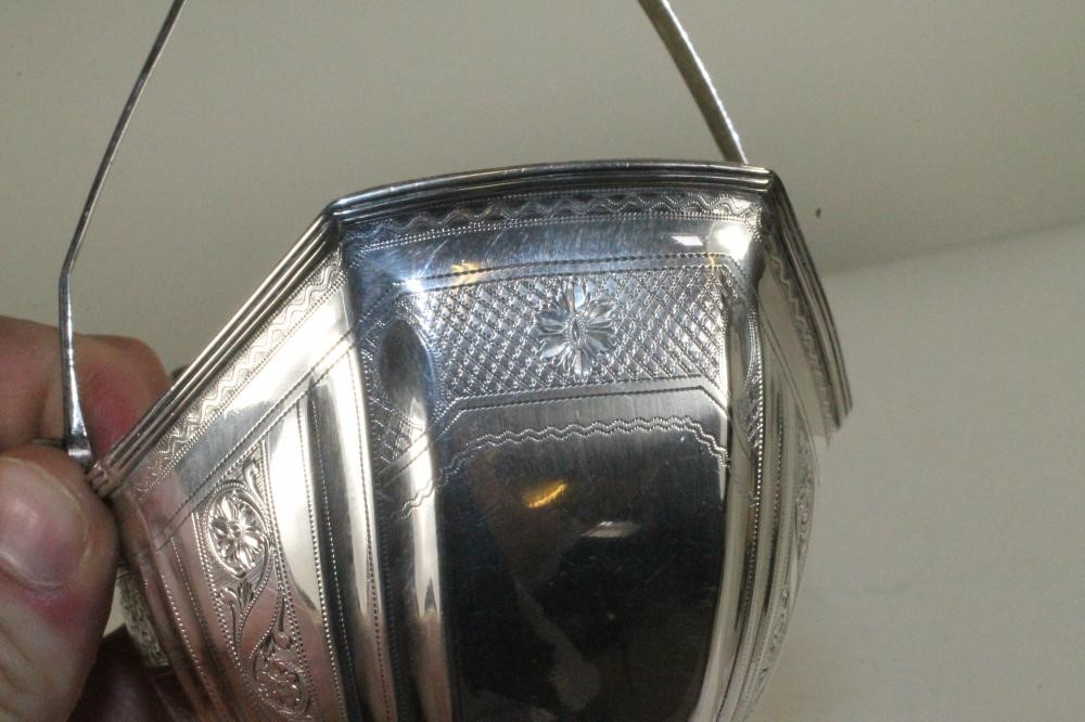 A LATE GEORGE III SILVER SUGAR BASKET Image