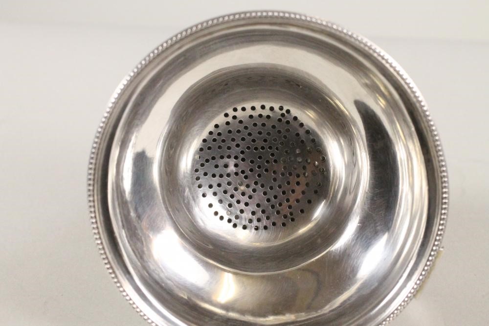 A GEORGE III SILVER WINE FUNNEL Image