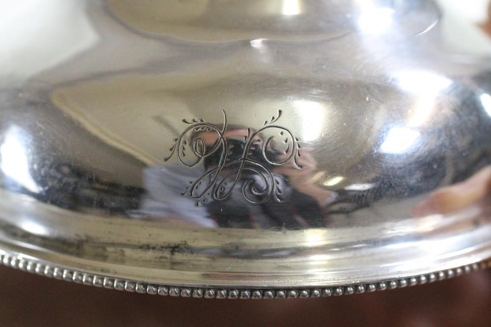 A GEORGE III SILVER WINE FUNNEL Image