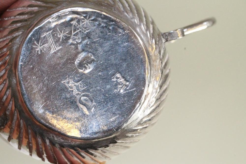 A MATCHED AND COMPOSITE SET OF THREE MINIATURE SILVER PORRINGERS Image