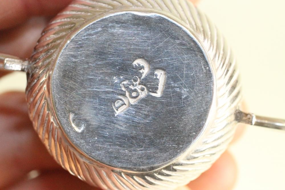 A MATCHED AND COMPOSITE SET OF THREE MINIATURE SILVER PORRINGERS Image