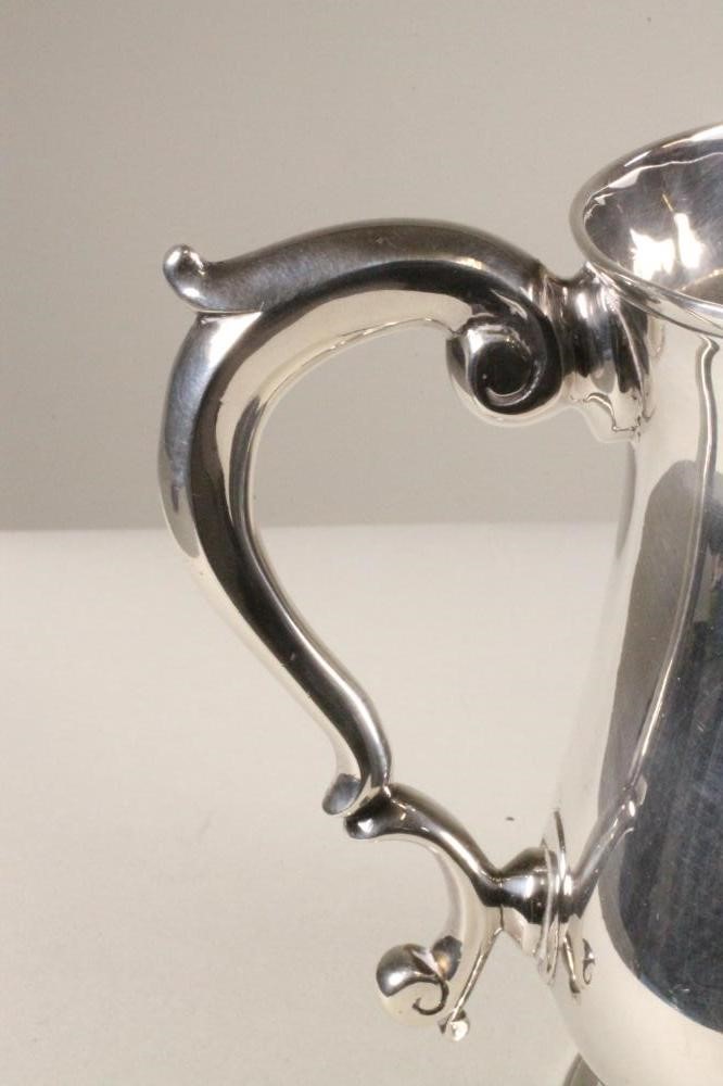 A GEORGE II SILVER PINT MUG Image