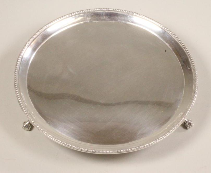 A GEORGE III SILVER WAITER Image