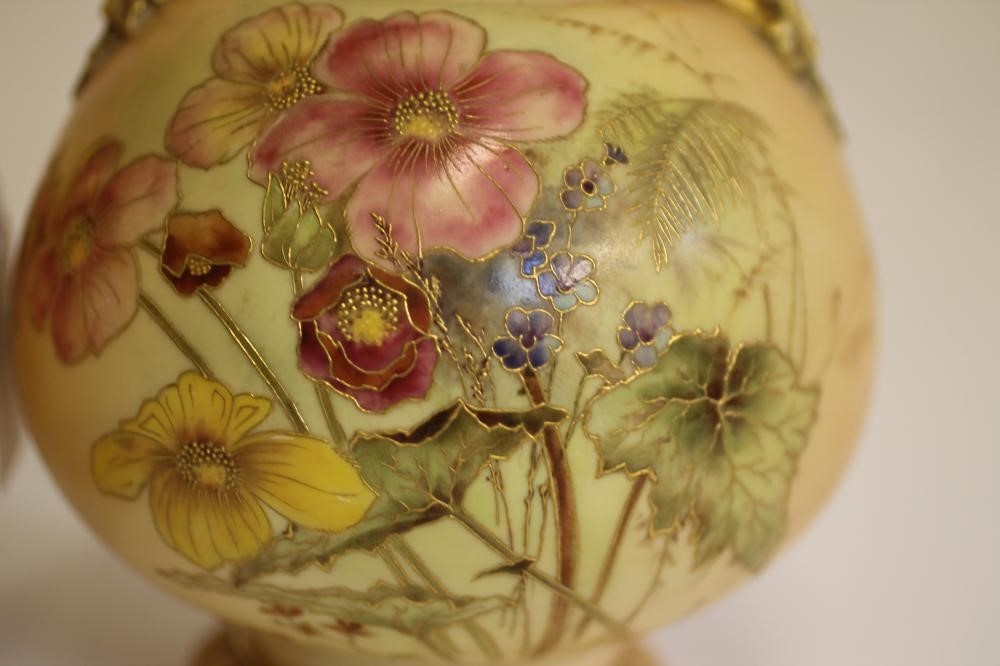 A PAIR OF ROYAL WORCESTER CHINA BOTTLE VASES Image