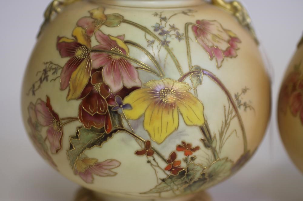 A PAIR OF ROYAL WORCESTER CHINA BOTTLE VASES Image