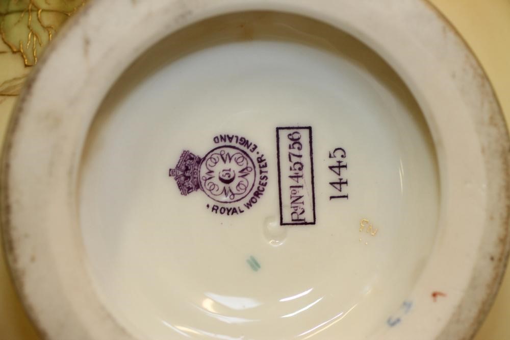 A PAIR OF ROYAL WORCESTER CHINA BOTTLE VASES Image