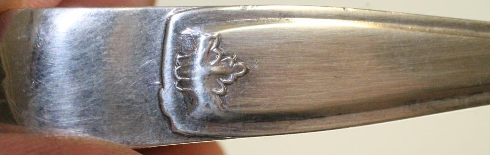 A PAIR OF GEORGE III SCOTTISH PROVINCIAL SILVER SUGAR TONGS Image