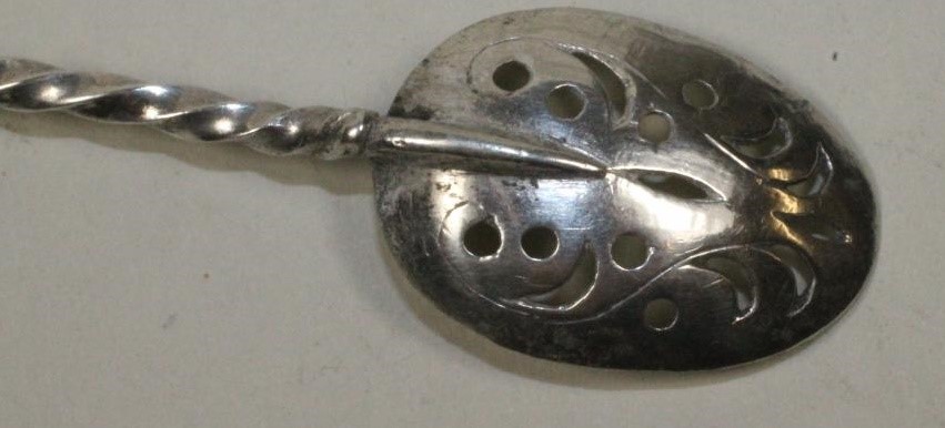 A CONTINENTAL MOTE SPOON Image