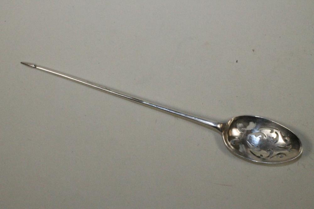 A LATE GEORGE II SILVER MOTE SPOON Image