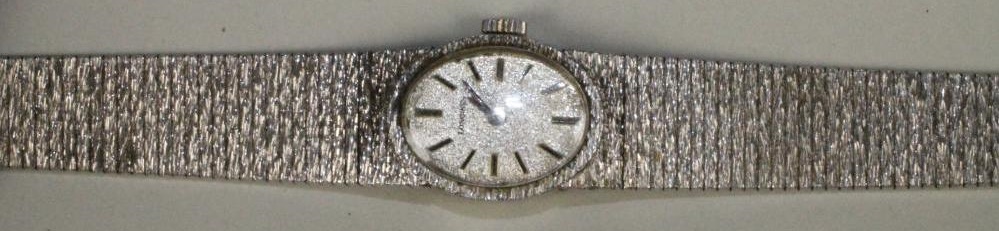 A LADY'S SILVER "LONGINES" WRISTWATCH Image