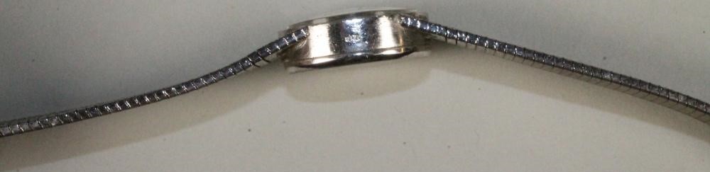 A LADY'S SILVER "LONGINES" WRISTWATCH Image