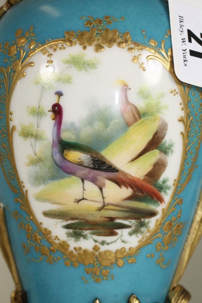 A PAIR OF SEVRES STYLE PORCELAIN GARNITURE EWERS Image