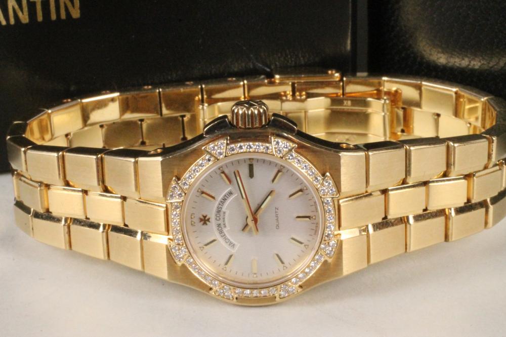 A LADY'S 18CT GOLD AND DIAMOND VACHERON CONSTANTIN "OVERSEAS" WRISTWATCH Image