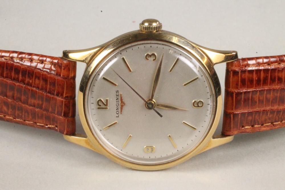 A GENTLEMAN'S 9CT GOLD LONGINES WRISTWATCH Image
