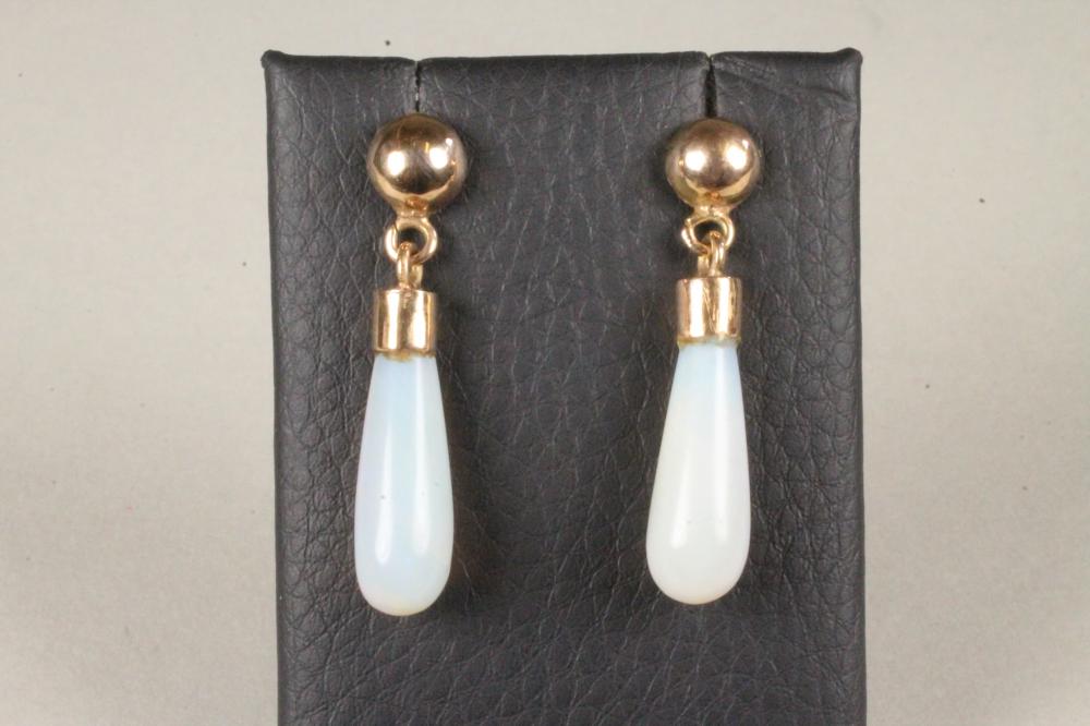 A PAIR OF POLISHED OPAL EAR BOBS on plain studs and posts Image