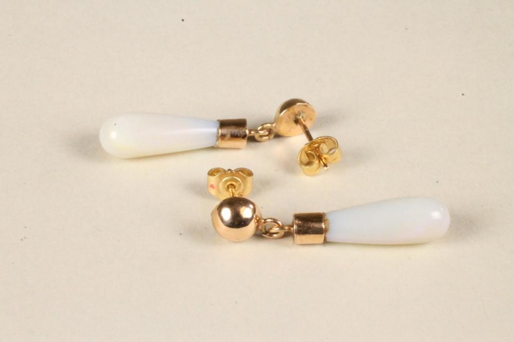 A PAIR OF POLISHED OPAL EAR BOBS on plain studs and posts Image