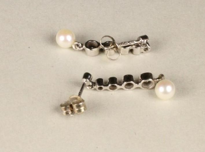 A PAIR OF DIAMOND AND PEARL DROP EARRINGS Image