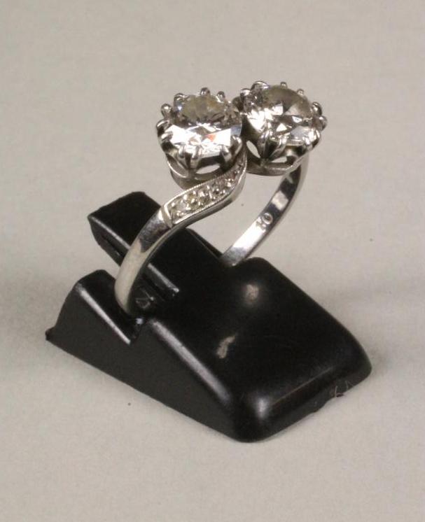 A TWO STONE DIAMOND CROSSOVER RING Image