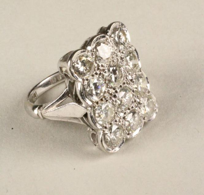 A DIAMOND PLAQUE RING Image