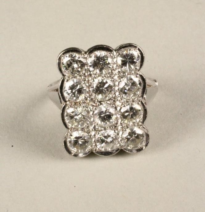 A DIAMOND PLAQUE RING Image