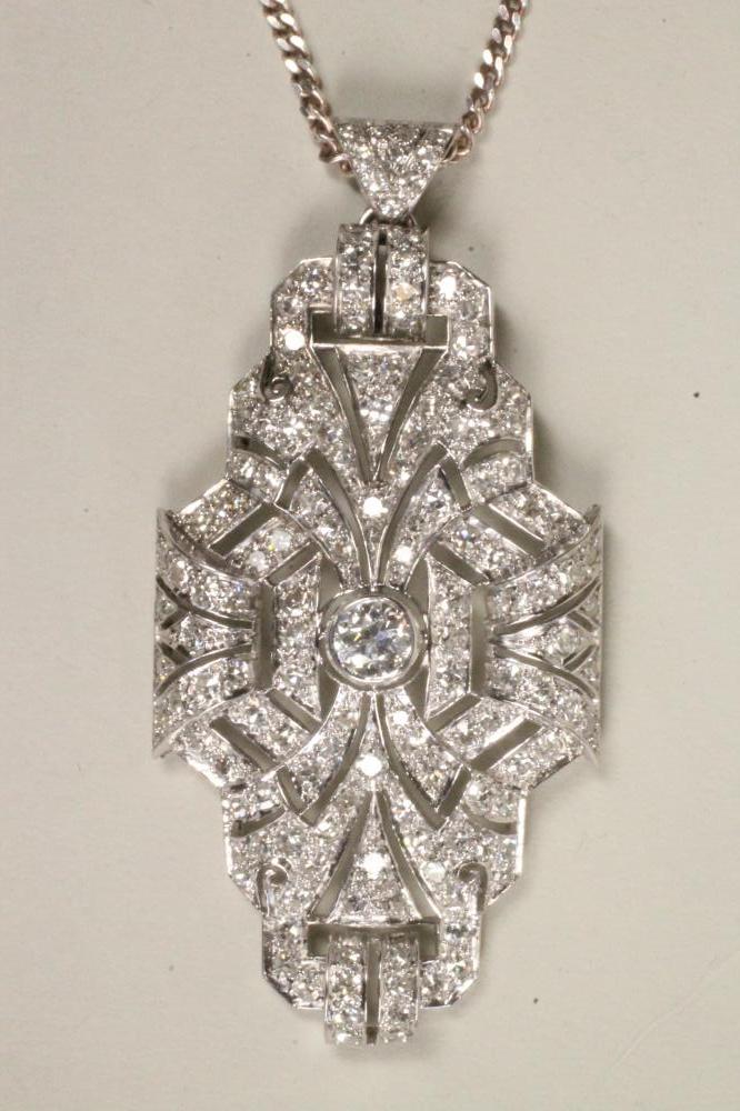 AN ART DECO DIAMOND PENDANT of quatrefoil form Image